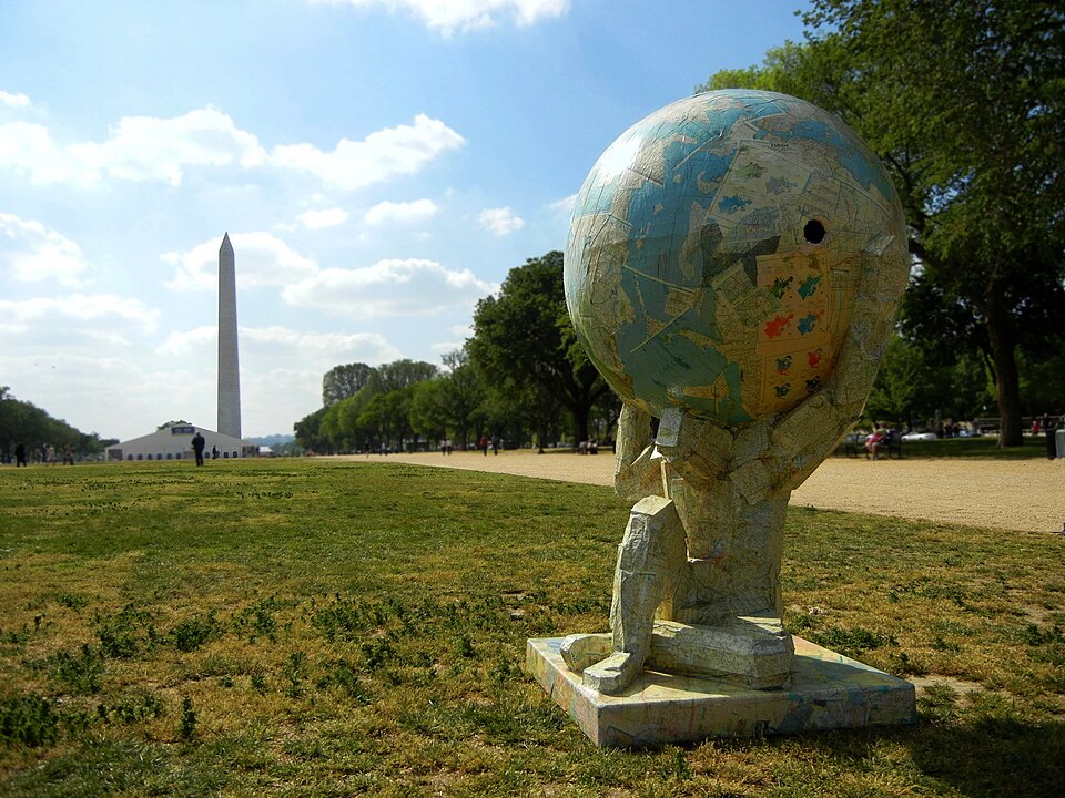A recycled art sculpture made from used maps and atlases displayed on the National Mall