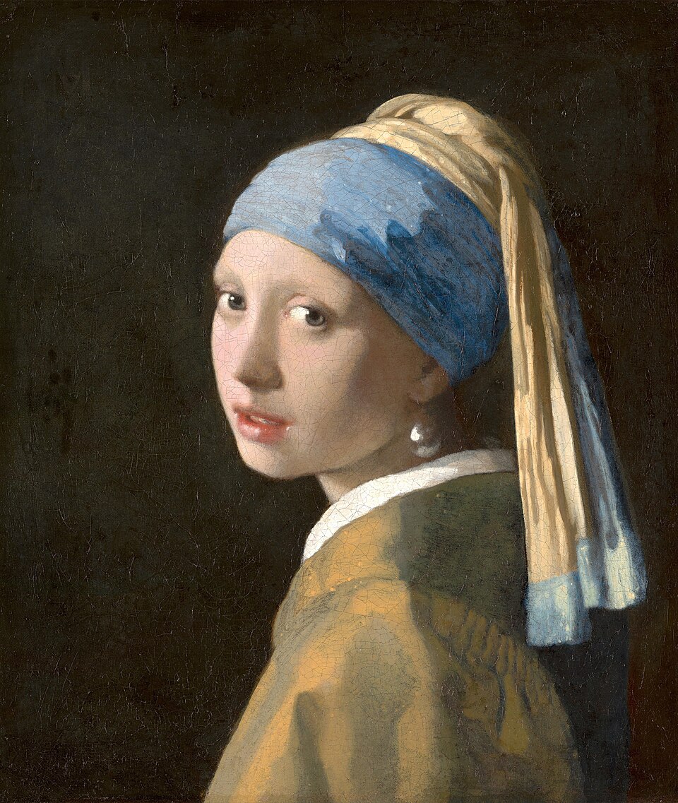 Girl with a Pearl Earring by Johannes Vermeer, showing a young woman with a blue and gold turban and a luminous pearl earring