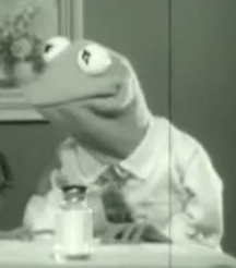 An early black and white photo of Kermit the Frog puppet from 1964, created by Jim Henson
