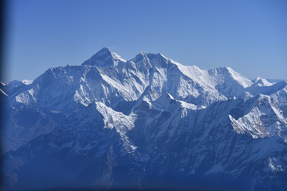 The snow-covered peak of Mount Everest in the Himalayas