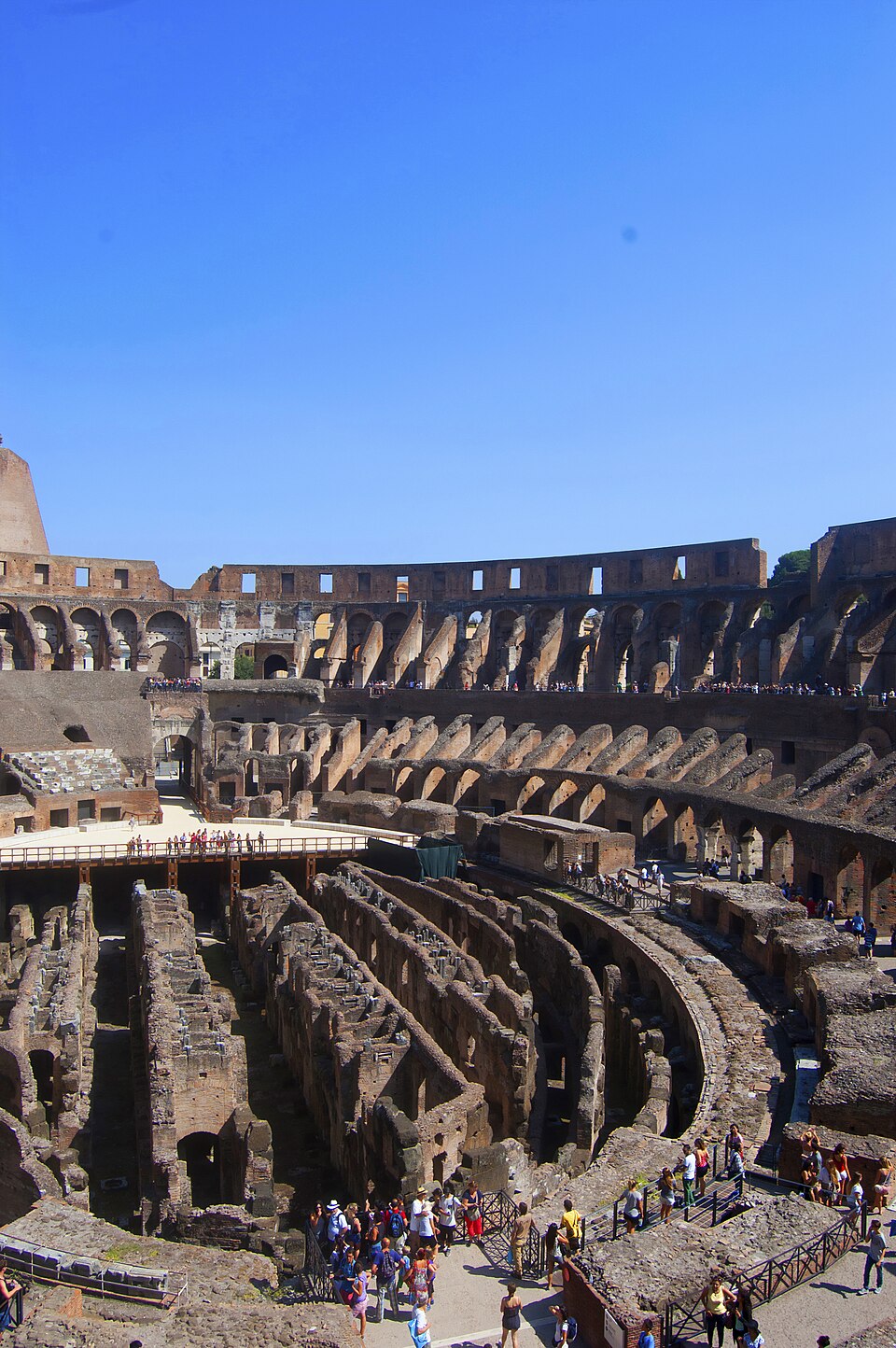 The inside of the Colosseum in Rome showing the arena and ancient stone walls