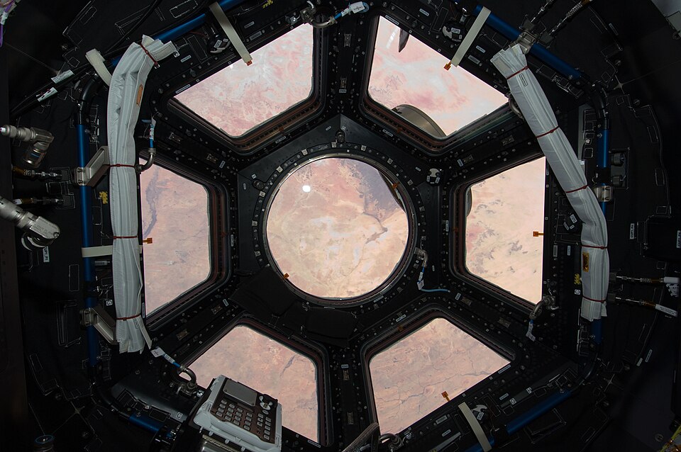 The view of Earth through the seven windows of the ISS Cupola