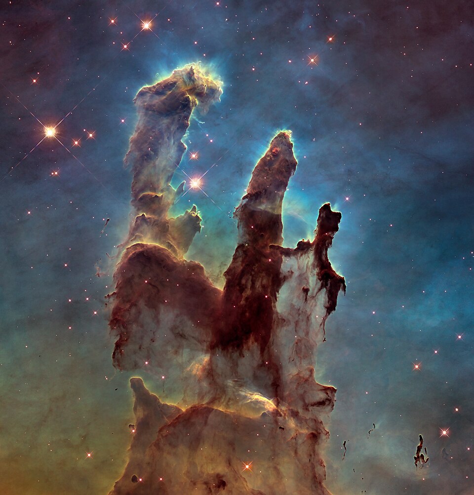 The Pillars of Creation, a colorful nebula photographed by the Hubble Space Telescope